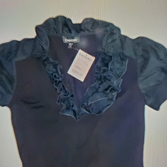 Bebe NWOT Puff Sleeve Ruffle Dress — (tag fell off). Never worn - Picture 3 of 11